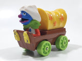 1987 Playskool Muppets Sesame Street Cowboy Grover Chuck Wagon Yellow and Brown Die Cast Toy Car Vehicle