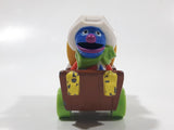1987 Playskool Muppets Sesame Street Cowboy Grover Chuck Wagon Yellow and Brown Die Cast Toy Car Vehicle