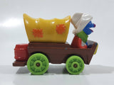 1987 Playskool Muppets Sesame Street Cowboy Grover Chuck Wagon Yellow and Brown Die Cast Toy Car Vehicle
