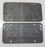 Set of Matching Vintage 1975 Saskatchewan Red Lettering White Vehicle License Plate Metal Tags 208 864