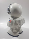 1989 - 1991 NASA Astronaut Shaped Plastic 8 1/2" Tall Digital Alarm Clock Coin Bank with Coin Distinguishing Mechanism and Lights & Sound U.S. Pat No. 4998611