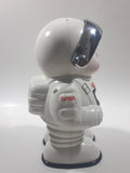 1989 - 1991 NASA Astronaut Shaped Plastic 8 1/2" Tall Digital Alarm Clock Coin Bank with Coin Distinguishing Mechanism and Lights & Sound U.S. Pat No. 4998611