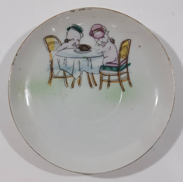 Vintage Occupied Japan Style Chubby Male and Female Nude Naked Cherub Like Characters Sitting At A Table 4 1/4" Diameter Hand Painted Porcelain Plate