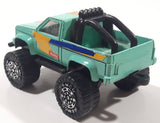 Vintage 1987 Remco 4x4 Pickup Truck Autolite Light Teal Green Pressed Steel and Plastic Toy Car Vehicle