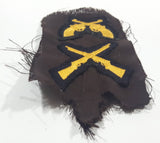 Vintage RCMP GRC Crossed Rifles and Crossed Revolver Hand Gun Fabric Shoulder Patch Insignia on Dark Brown Uniform