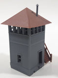 Grey and Brown Plastic Railroad Model Outpost Lookout Tower Building