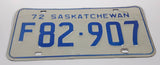 Vintage 1972 Saskatchewan Blue Lettering White Farm Vehicle License Plate Metal Tag F 82 907