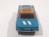 Disney Pixar Cars #11 Mario Andretti Teal Blue Green 427 C.I. Die Cast Toy Race Car Vehicle