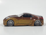 ERTL Joy Ride Universal Studios Fast and Furious Tokyo Drift 2006 Nissan 350Z Gold and Brown Die Cast Toy Car Vehicle Missing Tires 3 1/4" Long