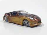 ERTL Joy Ride Universal Studios Fast and Furious Tokyo Drift 2006 Nissan 350Z Gold and Brown Die Cast Toy Car Vehicle Missing Tires 3 1/4" Long