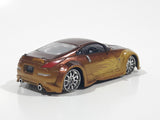 ERTL Joy Ride Universal Studios Fast and Furious Tokyo Drift 2006 Nissan 350Z Gold and Brown Die Cast Toy Car Vehicle Missing Tires 3 1/4" Long