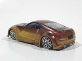ERTL Joy Ride Universal Studios Fast and Furious Tokyo Drift 2006 Nissan 350Z Gold and Brown Die Cast Toy Car Vehicle Missing Tires 3 1/4" Long