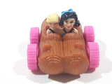 1993 McDonald's U.C.S. & Amblin The Flintstones Betty Rubble and Bamm Bamm in Log Car Plastic Toy Vehicle 1 3/4" Long