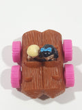 1993 McDonald's U.C.S. & Amblin The Flintstones Betty Rubble and Bamm Bamm in Log Car Plastic Toy Vehicle 1 3/4" Long