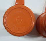 Vintage Tupperware Orange Measure Cups and Spoons Set
