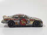1999 Racing Champions NASCAR #94 McDonald's Win $1 Million Ford Gold Chrome Die Cast Toy Race Car Vehicle