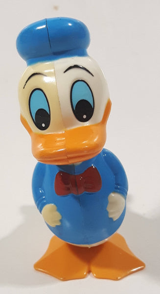 Tomy Walt Disney Productions Donald Duck Wobbling Shaking Wind Up Plastic Toy Figure