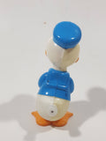 Tomy Walt Disney Productions Donald Duck Wobbling Shaking Wind Up Plastic Toy Figure