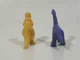 Set of 2 Toy Rubber Dinosaur Figures One Yellow One Purple
