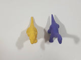 Set of 2 Toy Rubber Dinosaur Figures One Yellow One Purple