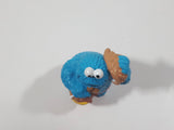 Applause Muppets Sesame Street Cookie Monster Character In Beach Shorts with a Pail of Shells Holding a Conch Shell To His Ear 3" Tall PVC Toy Figure