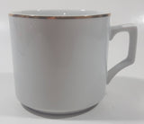 Vintage Walt Disney Productions Disneyland 3 1/4" Tall White with Gold Trim Porcelain Coffee Mug Cup