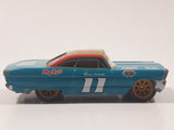 Disney Pixar Cars #11 Mario Andretti Teal Blue Green 427 C.I. Die Cast Toy Race Car Vehicle