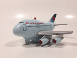 Toy Tech Air Canada Jumbo Jet Pull Back Light Up Plastic Die Cast Toy Airplane