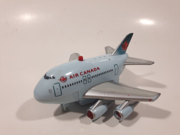 Toy Tech Air Canada Jumbo Jet Pull Back Light Up Plastic Die Cast Toy Airplane