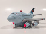 Toy Tech Air Canada Jumbo Jet Pull Back Light Up Plastic Die Cast Toy Airplane