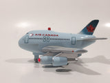 Toy Tech Air Canada Jumbo Jet Pull Back Light Up Plastic Die Cast Toy Airplane