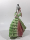Vintage Lady in Green and Pink Dress with Grey Bonnet 7 3/4" Tall Porcelain Figurine