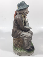 Vintage Old Man and Woman Couple Woman Whispering In His Ear Book and Teapot Set 7" Tall Figurine Sculpture