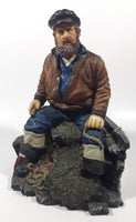 Captain on Rickety Boat Sitting In Busted Up Broken Life Raft Row Boat 9" Tall Weight Resin Figurine