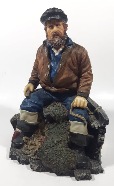 Captain on Rickety Boat Sitting In Busted Up Broken Life Raft Row Boat 9" Tall Weight Resin Figurine
