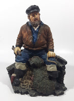 Captain on Rickety Boat Sitting In Busted Up Broken Life Raft Row Boat 9" Tall Weight Resin Figurine