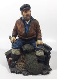 Captain on Rickety Boat Sitting In Busted Up Broken Life Raft Row Boat 9" Tall Weight Resin Figurine