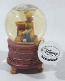Disney Store Exclusive Fairies Tinkerbell Sitting On Spools of Thread 3 1/2" Tall Miniature Footed Resin Snow Globe with Tag