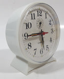 Vintage Cosmo White Plastic 4 1/2" Tall Wind Up Alarm Clock with Glow In The Dark Hands