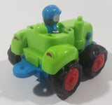 Blue Suited Driver In Green Tractor Plastic Toy Car Vehicle