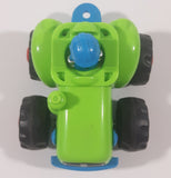Blue Suited Driver In Green Tractor Plastic Toy Car Vehicle