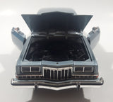 2011 Motor Max No. 73333 1986 Dodge Diplomat Metallic Light Blue 1/24 Scale 8 1/2" Long Die Cast Toy Car Vehicle with Opening Front Doors and Hood