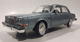 2011 Motor Max No. 73333 1986 Dodge Diplomat Metallic Light Blue 1/24 Scale 8 1/2" Long Die Cast Toy Car Vehicle with Opening Front Doors and Hood
