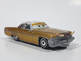 Disney Pixar Cars Cadillac Coupe de Ville Gold with Brown and White Cow Print Roof Die Cast Toy Car Vehicle