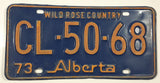 1973 Alberta Wild Rose Country Blue with Yellow Letters Vehicle License Plate CL 50 68