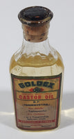 Antique Robinson & Webber Limited Winnipeg Packers Bottlers B.P. Pharmaceutical Goldex Gold Pure Cold Drawn London Castor Oil 4 1/2" Tall Glass Bottle with Cork Still FULL
