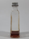 Vintage Malkin's Imitation Flavoring Extract Rum bottle from W.H. Malkin Ltd. of Vancouver, BC