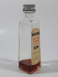 Vintage Malkin's Imitation Flavoring Extract Rum bottle from W.H. Malkin Ltd. of Vancouver, BC