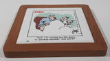 Vintage 1983 Universal Press Syndicate Herman "Dad, I'm writing my life story. Is 'poverty-stricken' one word?" 5 1/2" x 5 1/2" Wood Framed Ceramic Tile Trivet