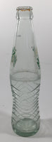 Mirinda 8 3/4" Tall 237mL Embossed Clear Glass Soda Pop Bottle